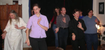Dance Mandal Portland singing and dancing the Three Jewels Refuge Prayer